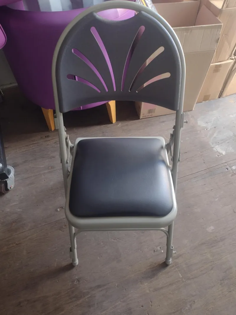 Black Padded Folding Chair with Decorative Back