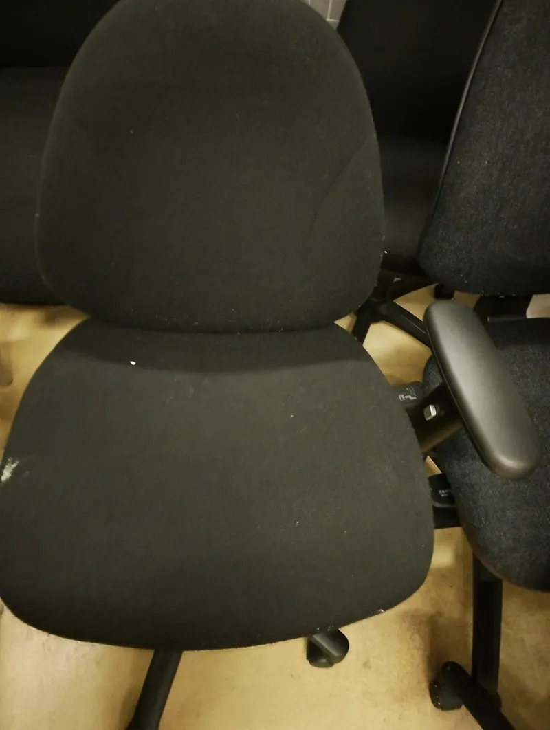 Black Fabric Office Chair no arm rest.