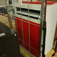 Red and Grey Metal storage unit.