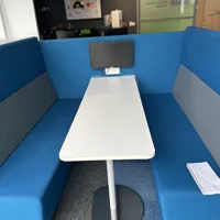 Blue Acoustic Privacy Booth with White Table and Monitor