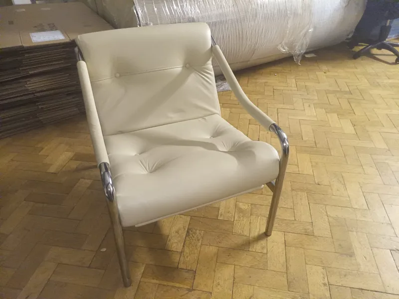 Cream Upholstered Lounge Chair with Metal Frame