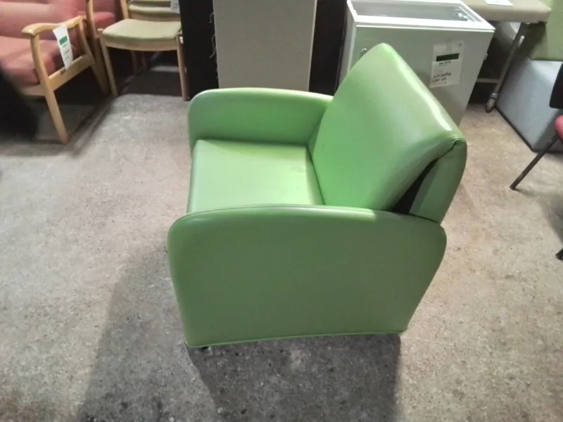 Green Upholstered Armchair with Footrest/Bed Conversion