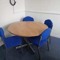 Round Meeting Table with 4 Blue Chairs