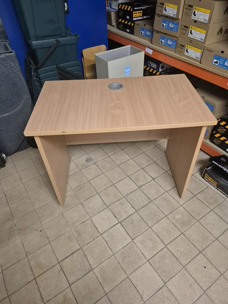 Light oak office desk with cable grommet